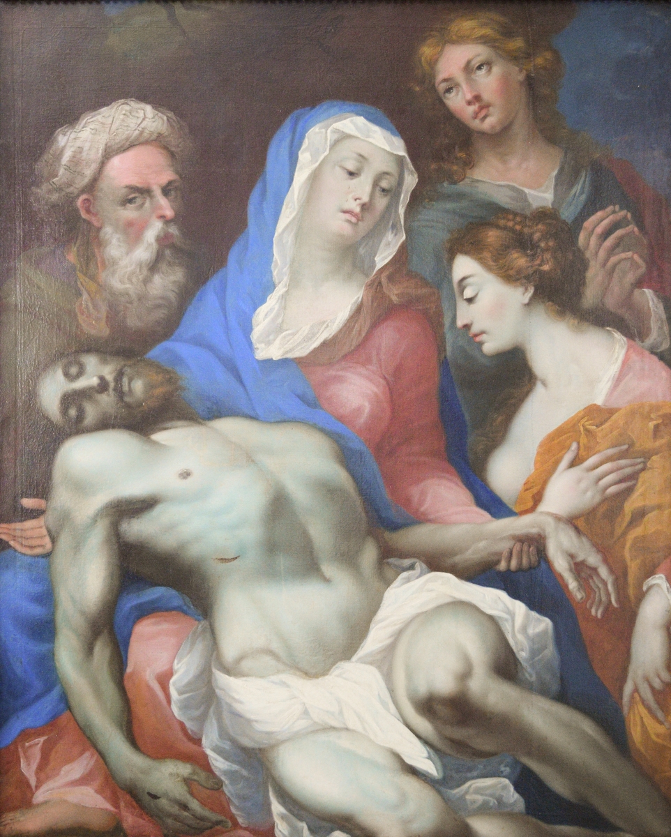 I pyramidal komposisjon død Kristus (med hvit klede om livet), Madonna (i blått, rødt og noe hvitt og brunt) og kvinnefigur (i gulbrunt og noe rosa og hvitt). To menn bak, til venstre i grønt med gråhvitt skjegg (Josef?), til høyre ung bedende mann i blågrønt. Mørk brun som er blå øverst til høyre.