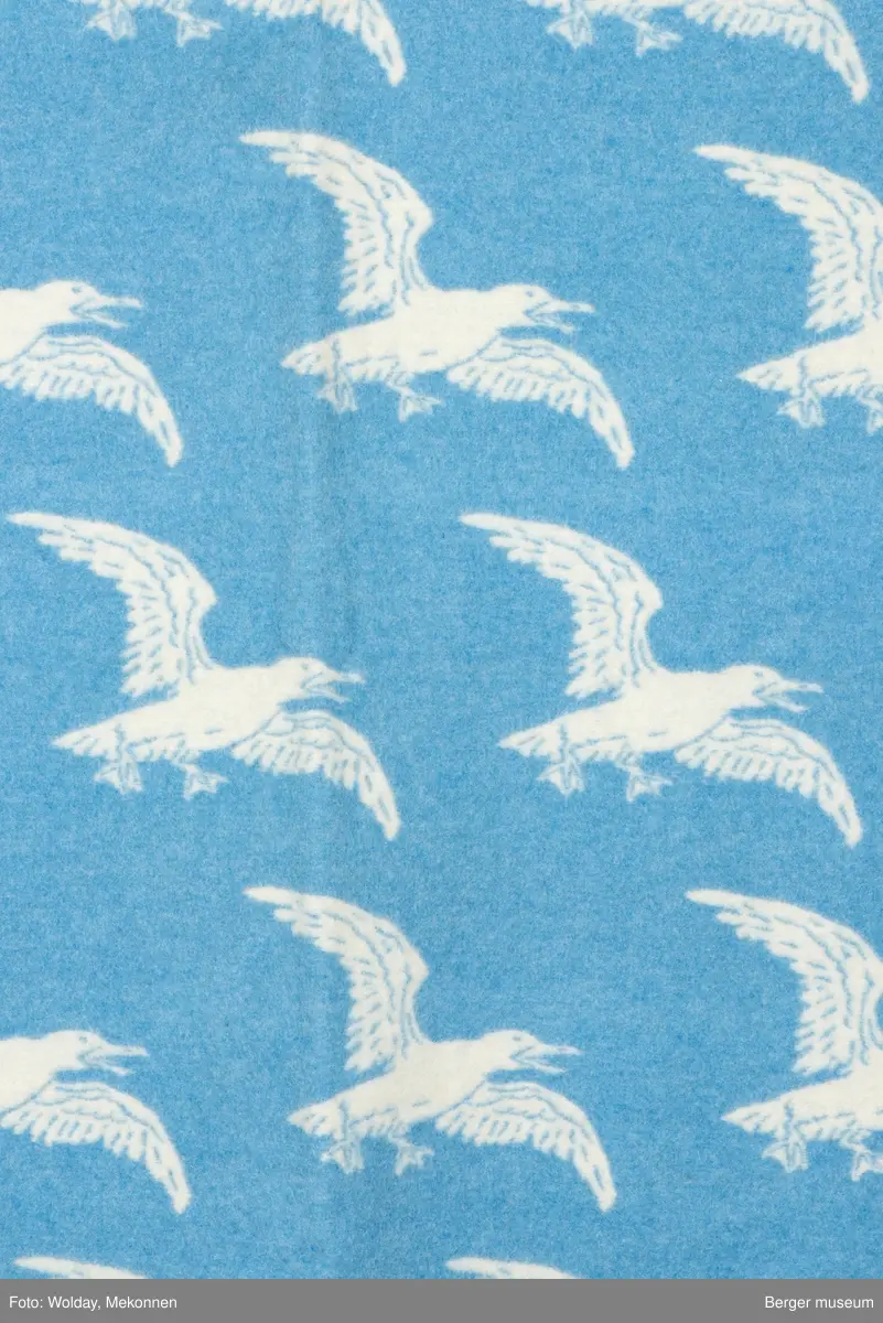 Pledd med måkemotiv