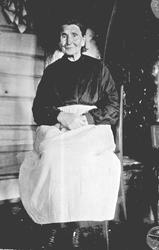 Portrett av kvinne. Ingrid Furuhovde f. Streitlien.