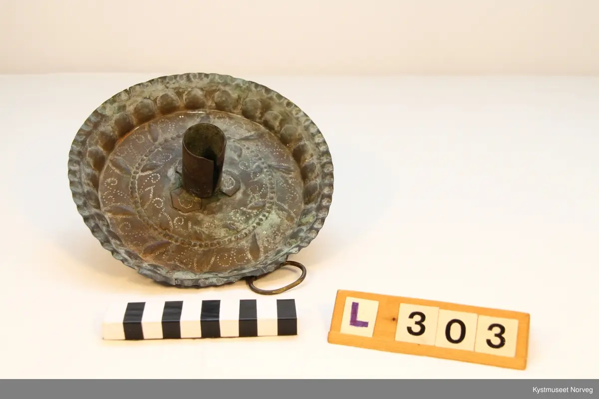 Lysestake av messing.