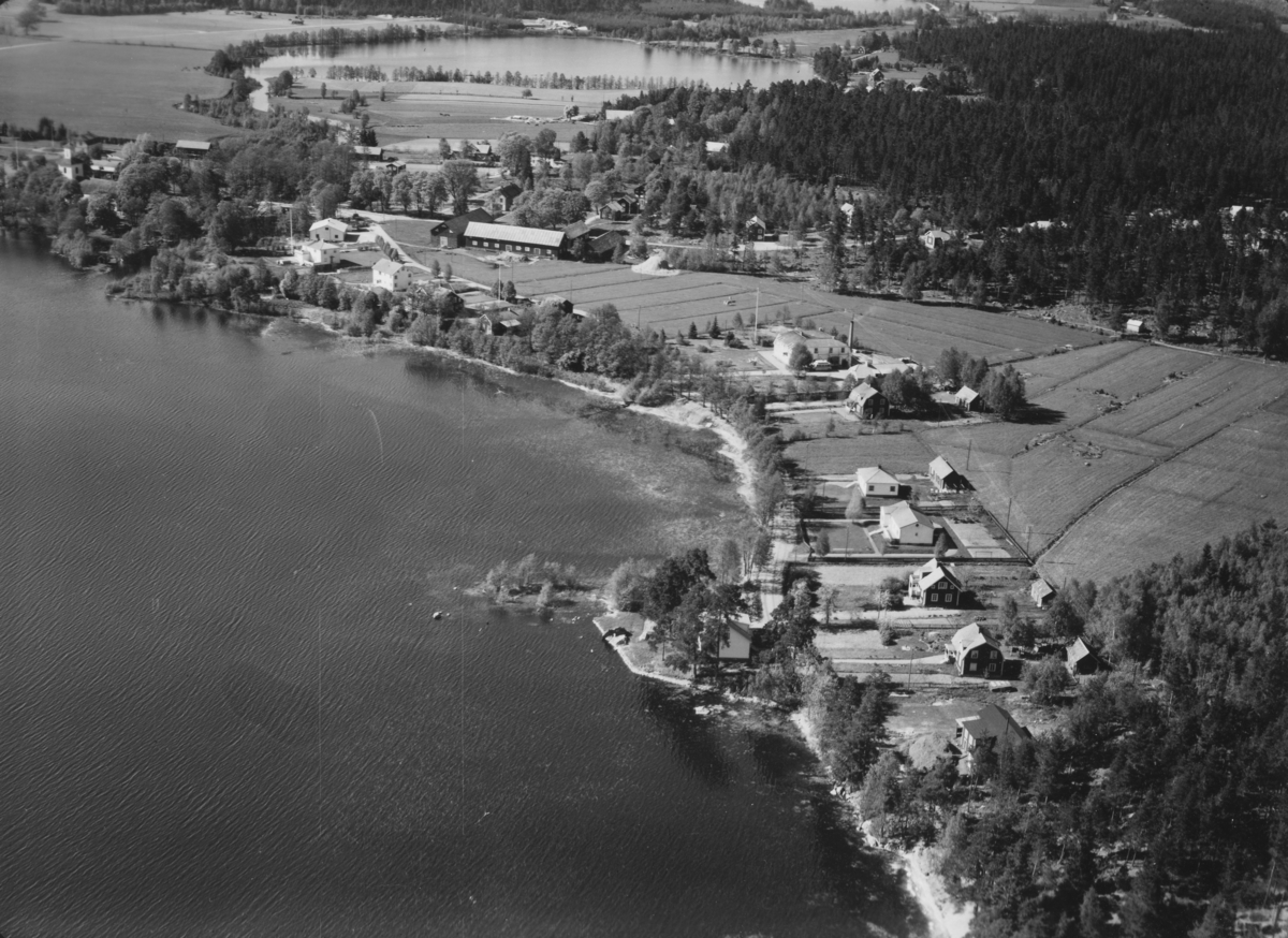 Flygfoto över Ramkvilla i Vetlanda kommun. Nr. M. 941