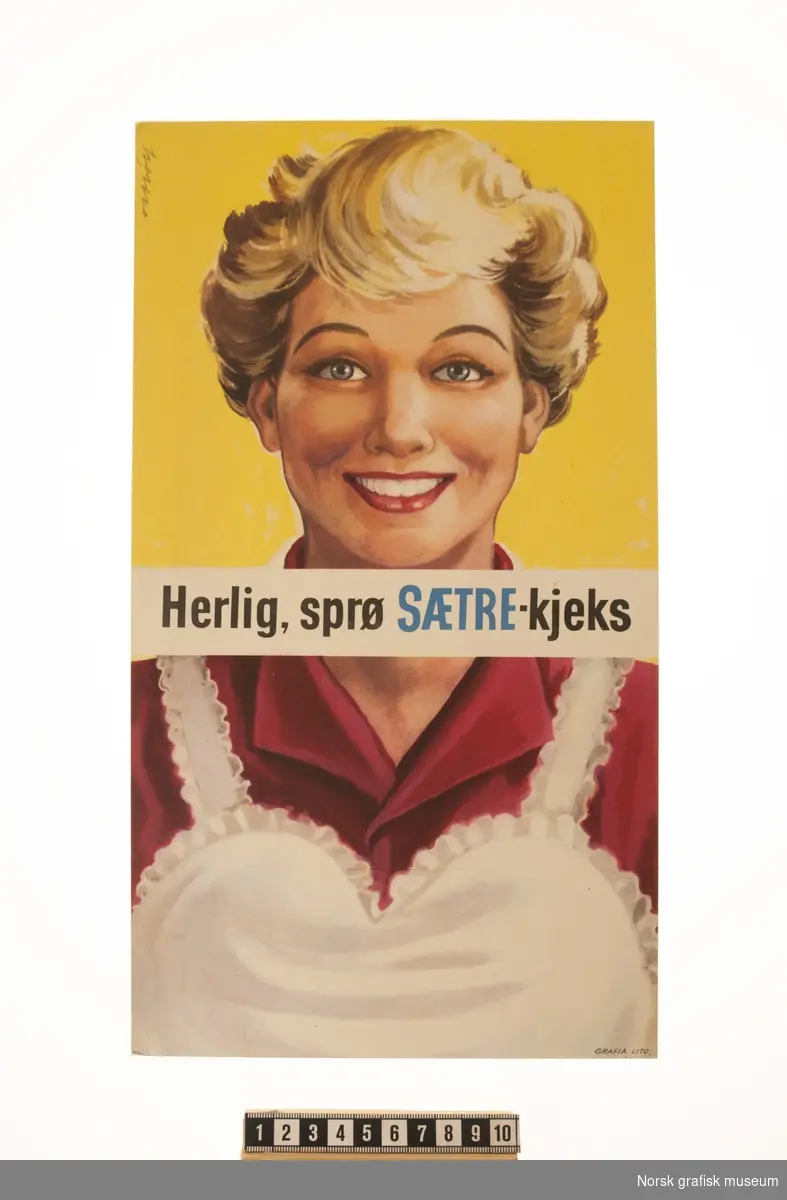 Plakat.
Motiv: En smilende kvinne med kort hår og kjøkkenforkle.
Tekst: Herlig, sprø SÆTRE-kjeks.
Trykk: Grafia Lito.
