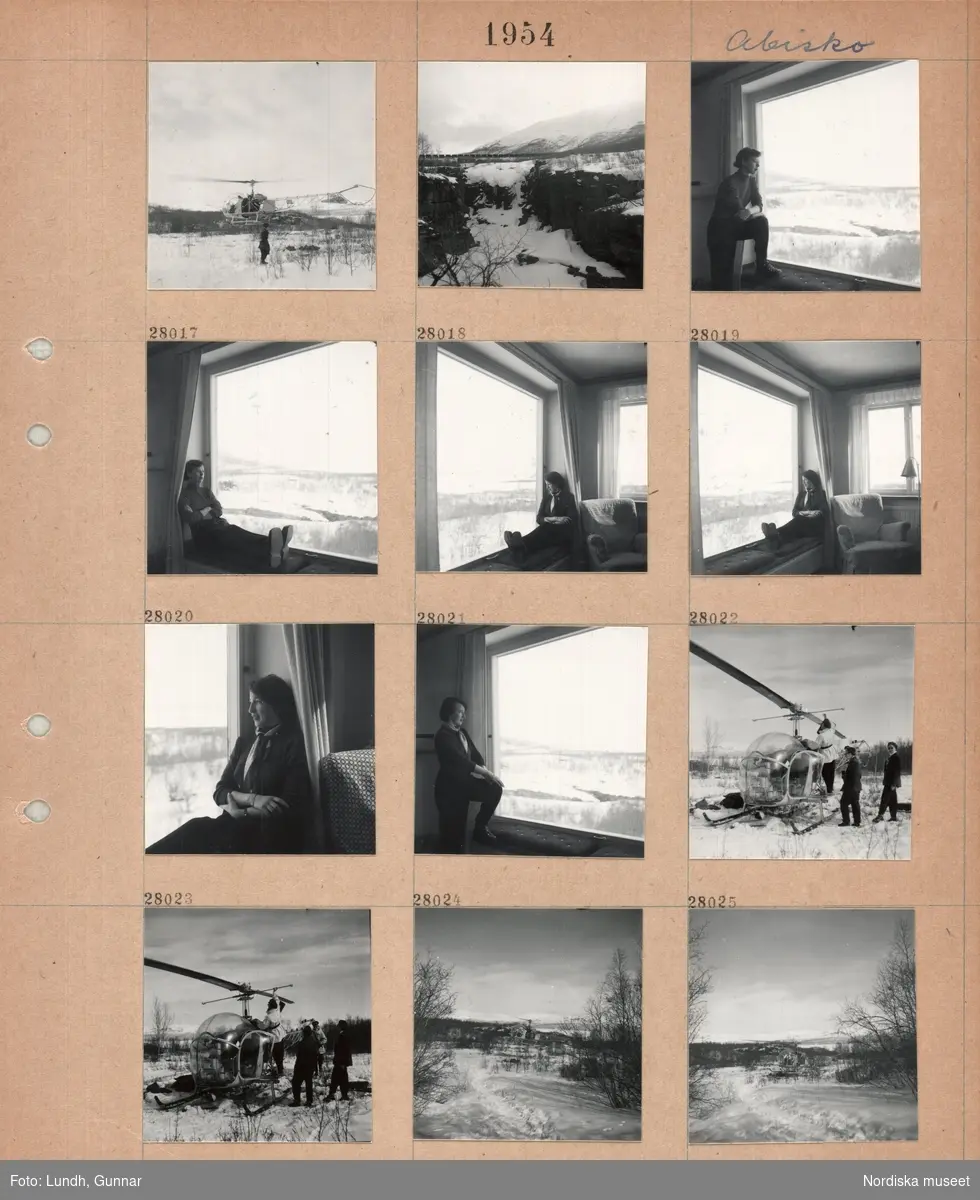 Motiv: Abisko (Resa till Lofoten) ;
En helikopter lyfter, landskapsvy med träd och fjäll, interiör med en kvinna som sitter i en fönsternisch, fyra personer står vid en helikopter.