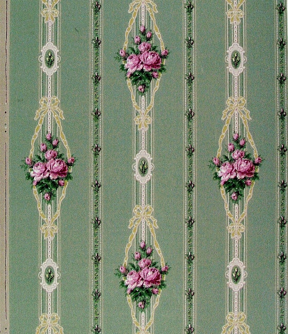 Vertikalt randmönster med wienerjugendornament i diagonalupprepning. Tryck i vitt och något senapsgult samt i flera rosa och gröna nyanser. Ofärgat papper.