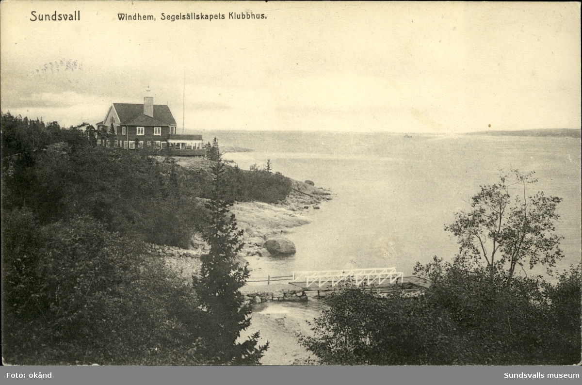 Vykort med motiv över Vindhem, segelsällskapets klubbhus i Sundsvall. Uppfört 1911.