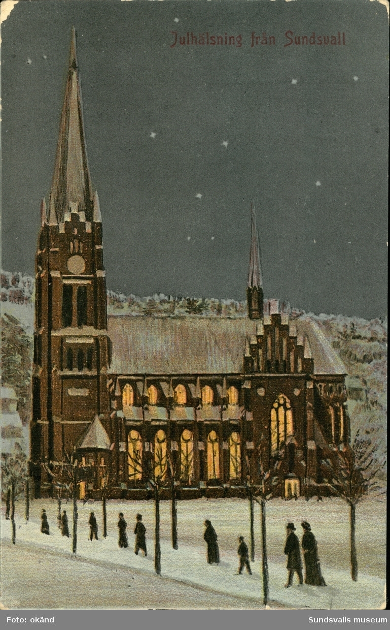Vykort med vintermotiv över Gustav Adolfs kyrka och texten: Julhälsning från Sundsvall.