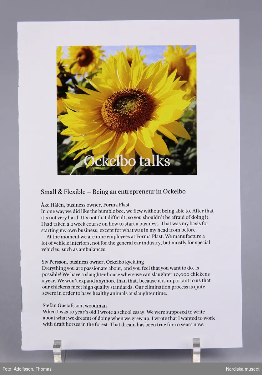 Broschyr, tryckt papper, 8 sidor, häftad. Framsida med bild på en solros och rubrik "Ockelbo talks". Text på engelska.
/Leif Wallin 2015-01-08