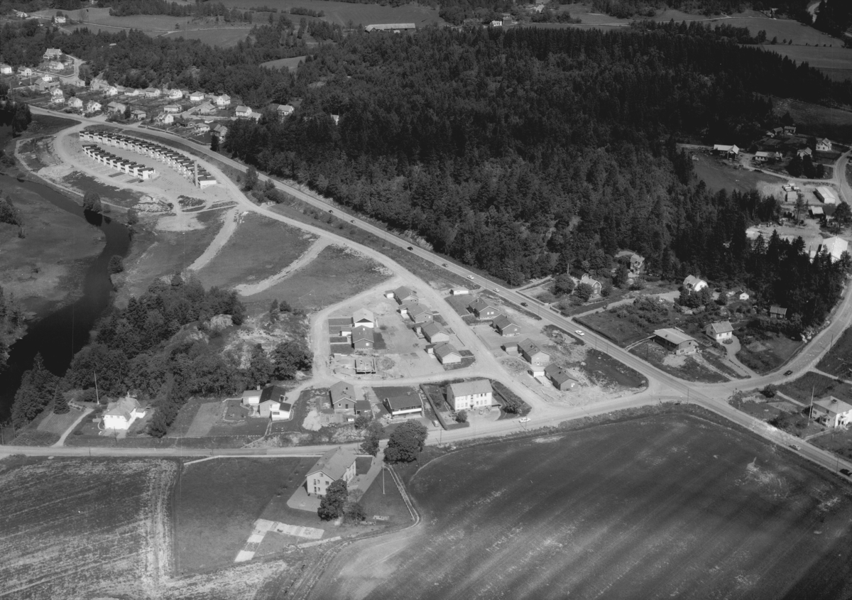 Flygfoto över Jutaholm i Huskvarna, Jönköpings kommun. 1300 / 1966