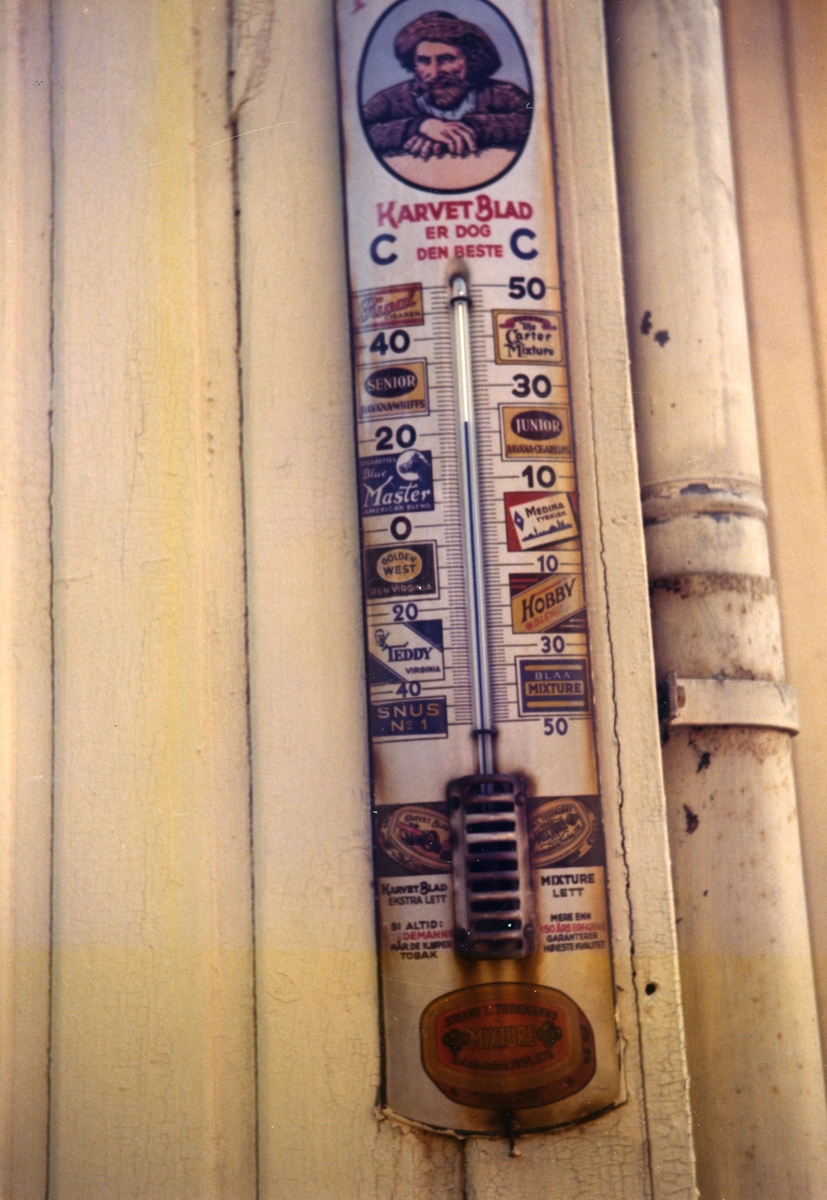 Termometer med reklame for Tiedemanns Tobak.