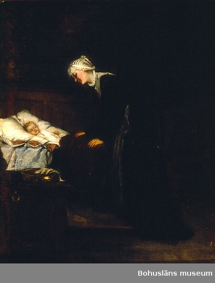 Kvinna lutar sig över ett sovande barn i en säng.