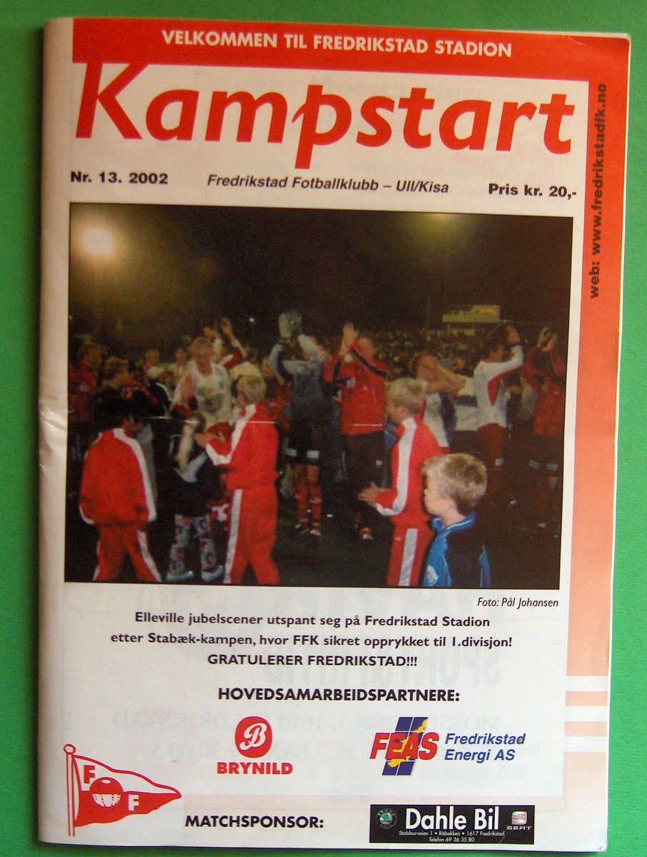 Kampprogram "Kampstart" fra kampen FFK- Ullensaker-Kisa 2002. Siste kamp detåret FFK rykket opp fra 2. til 1. divisjon. Trener Knut Torbjørn Eggen.