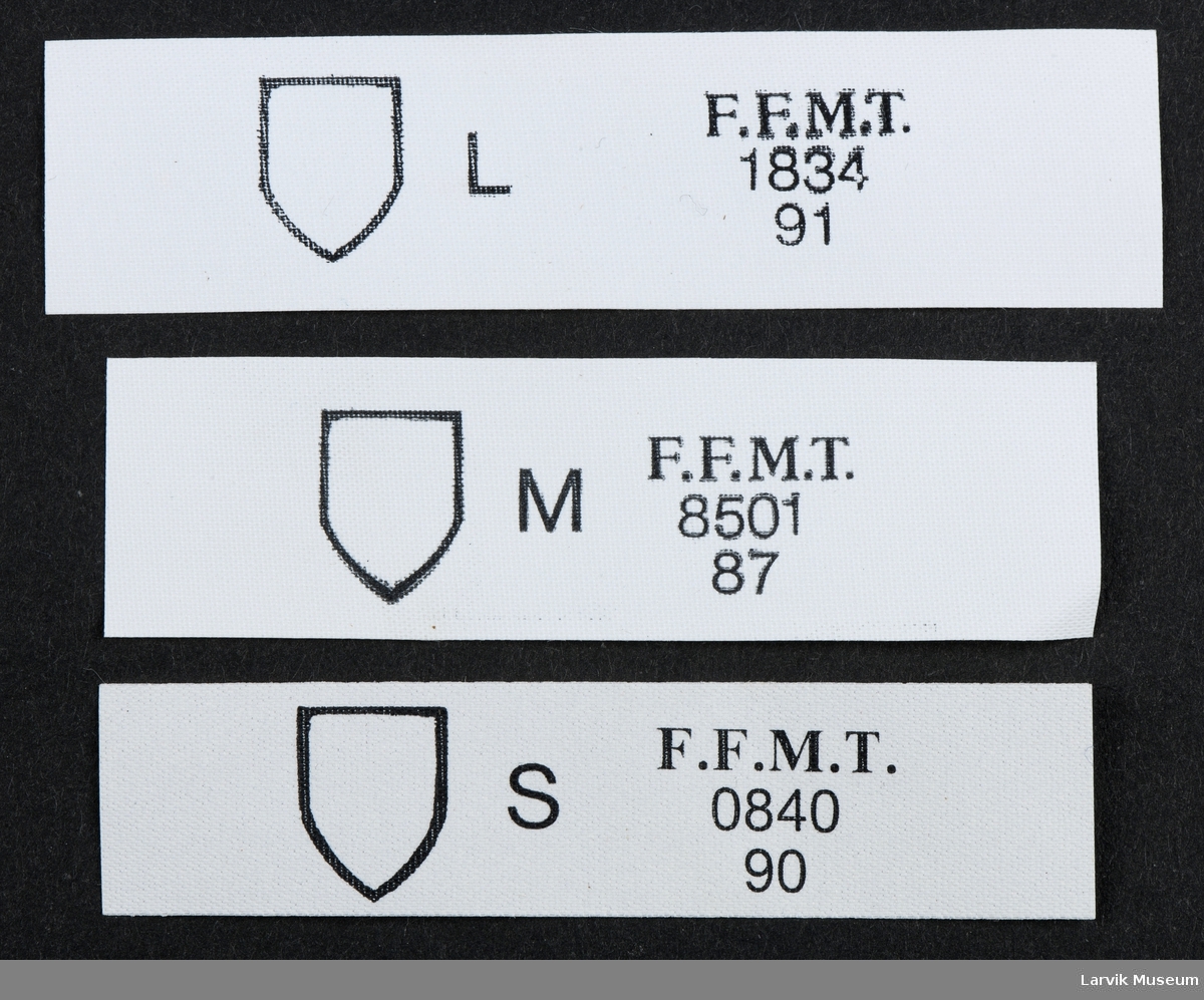 Logo: emblem/skjold. F.F.M.T.  S 840, 90.  M 8501, 87.  L 1834, 91